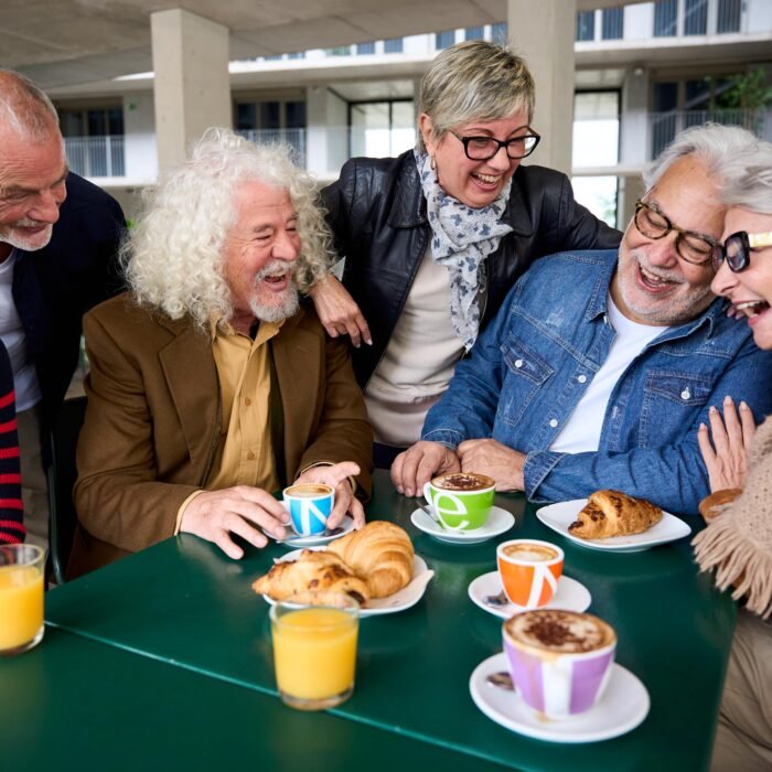 group-of-mature-grey-hair-friends-laughing-togethe-2025-01-09-18-37-46-utc-min